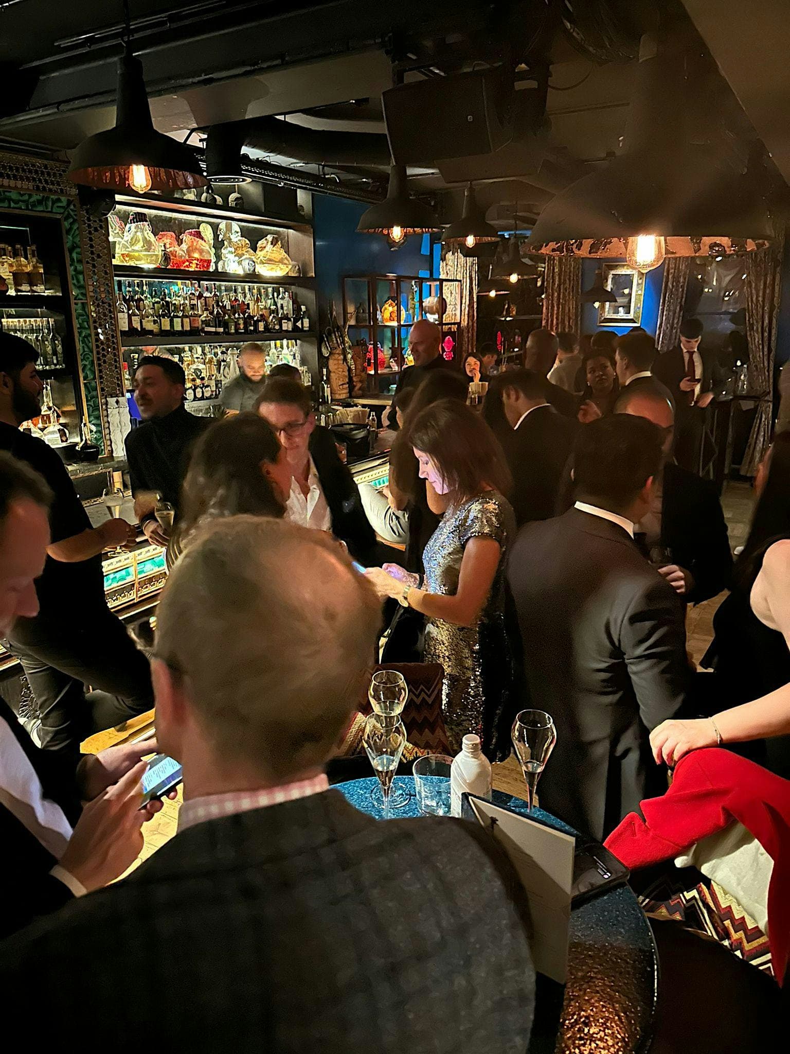 Guests in black tie at a PDN VIP networking reception
