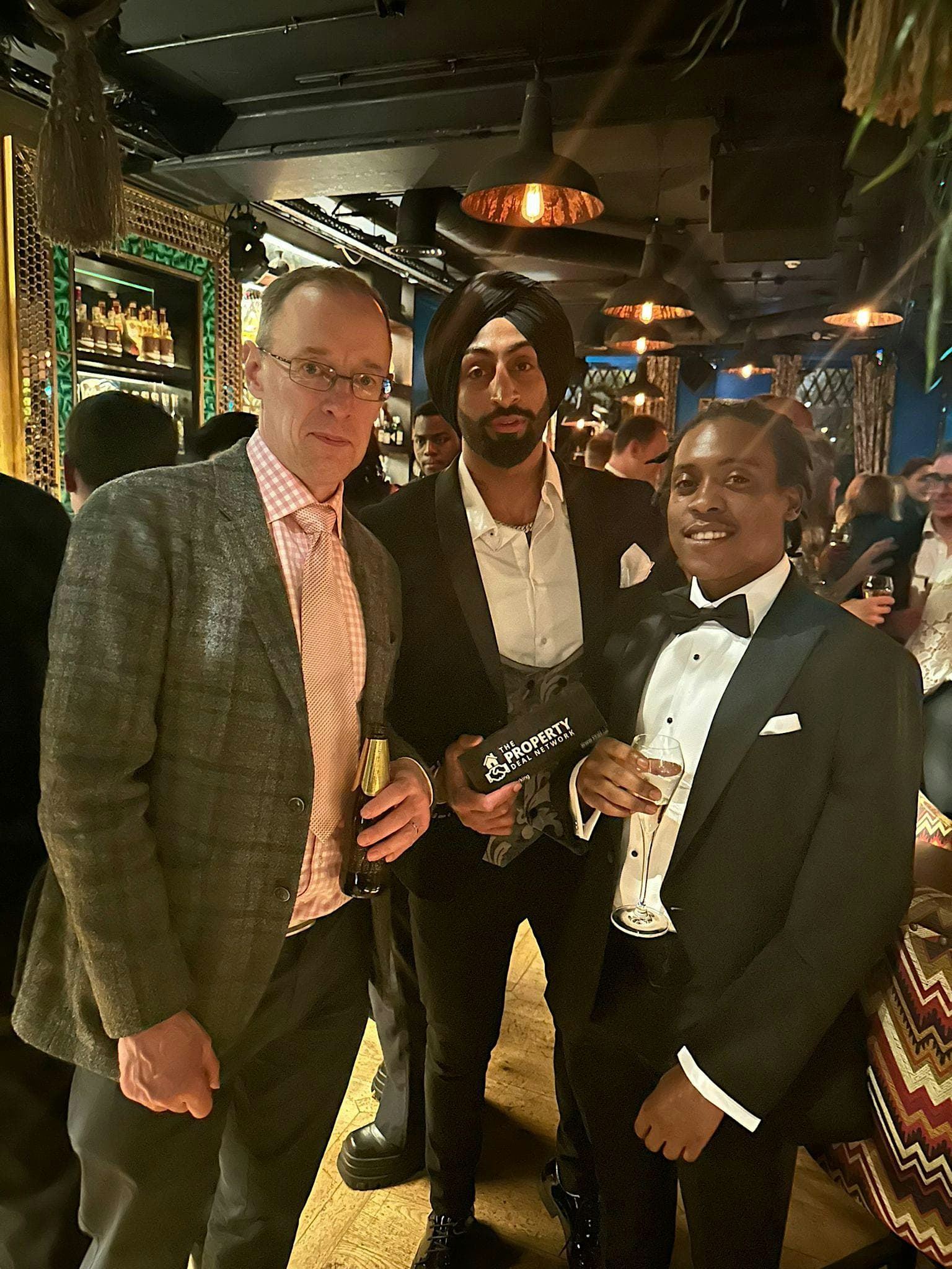Guests in black tie at a PDN VIP networking reception